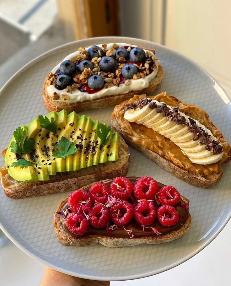Nutritious meal - avocado toast with fresh toppings